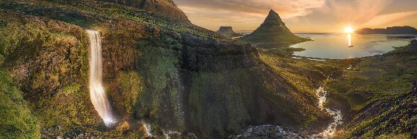 Islandia, Góra Kirkjufell, Chmury, Rzeka, Wodospad, Półwysep Snafellsnes, Promienie słońca