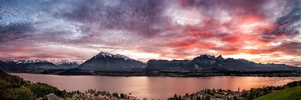 Szwajcaria, Alpy Berneńskie, Zachód słońca, Góry, Jezioro Thunersee, Chmury, Niebo