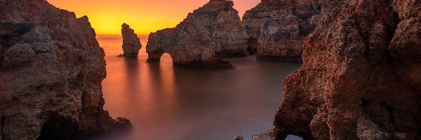 Zachód słońca, Morze, Wybrzeże, Algarve, Portugalia, Ponta da Piedade, Skały