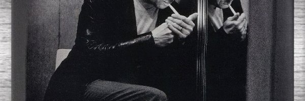 papieros, kurtka skórzana, Gary Oldman